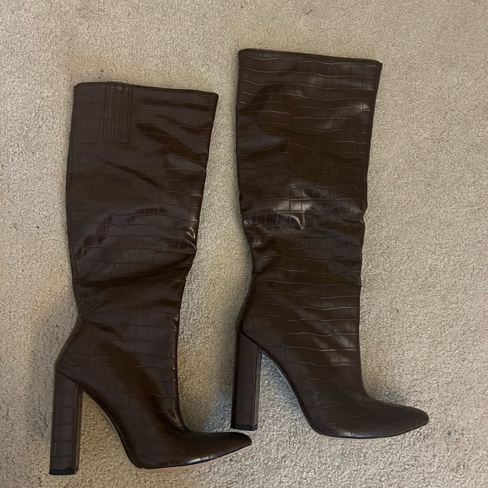 Brown tall boots with pointed toe
